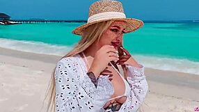 Big ass blonde receives a facial after a beach scene