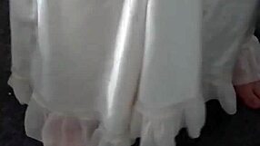 Woman in satin nightgown receives cum