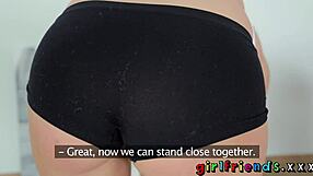 two fit girlfriends warm up with kisses before passionate lesbian sex