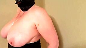 Huge tits BBW teases behind a mask in this homemade scene.