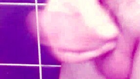 Gay man masturbates and cums in the bathroom with spanking