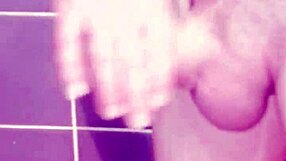 Gay man masturbates and cums in the bathroom with spanking