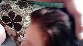 an amateur brunette wife gives the best blowjob ever, ending with a cumshot on her huge tits in pov