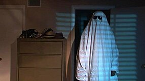 Halloween nude blonde girl in bed