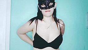 Teen striptease with tattoos and ripped clothes