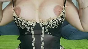 Stepmother masturbates with big dildo in front of her.