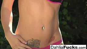 dahlia relaxes in a peaceful outdoor solo moment with her blonde hair shining