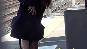 Japanese teen in uniform fingers her wet pussy suggestively