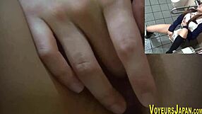 Japanese teen in uniform fingers her wet pussy suggestively