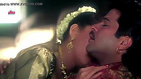 Watch Anil Kapoor and Madhuri kissing in this romantic scene.