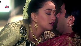 Watch Anil Kapoor and Madhuri kissing in this romantic scene.