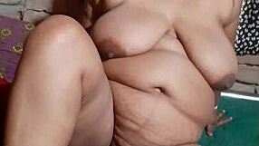 girl lies on the bed playing games with hindi dirty talk