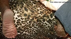 Curly-haired girl bent over for doggystyle with toe play