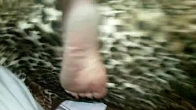 Curly-haired girl bent over for doggystyle with toe play