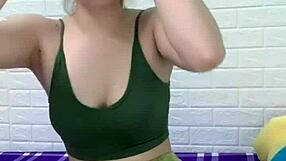 Asian woman wears two-piece dress with big white ass.