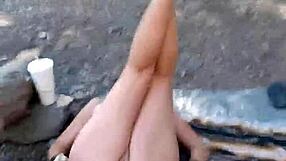 blond milf fingers pussy in public, gets creamed outdoors