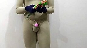 In the dungeon, zentai femdom inflicts painful CBT on slave's penis