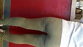 Hidden candid moment in leggings.