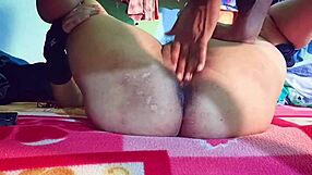 The bhabhi engages in hard anal sex with closeup views of her big ass