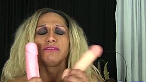 watch this tattooed shemale pornstar finger her ass while masturbating solo in fetish session