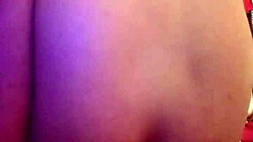 Stretching to fit the buttplug all the way in!