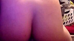 Stretching to fit the buttplug all the way in!