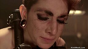 tattooed redhead endures hard whipping and fucking