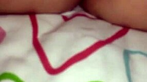 In a Japanese scene, she fingers her partner deeply.