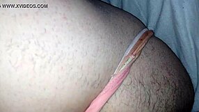 Sissy slut playing with dildo and chastity belt