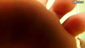 Smelly feet babe gives a handjob to her couple partner at home