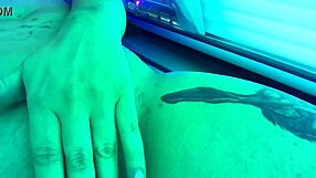 Milf blonde gets off on gym tanning bed.