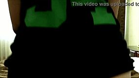 I pose seductively in this photoshoot with petite Dahut, showcasing her tattooed brunette body.