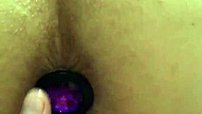 young latin girl uses butt plug