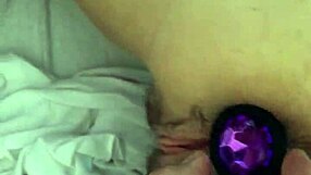 young latin girl uses butt plug