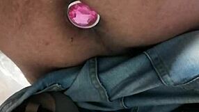 Watch me plug that tight ass with a dildo.