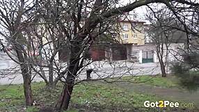 Blonde Enjoys a Messy Piss Outside in Public Czech Scene