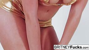 Britney Amber playfully sticks a toy deep in her wet pussy