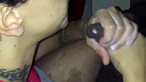 Slut gives handjob to big black cock