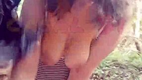 Submissive girlfriend sucks and fucks hard on a nature trail with rough bondage