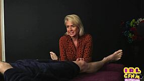 in a cfnm scene, tattooed milf sucks and wanks amateur dick