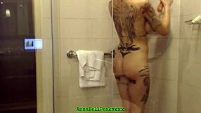 Tattooed MILF Showers Under the Camera