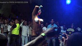 i saw this sexy latina strip naked at the club, ripping her clothes off while dancing.