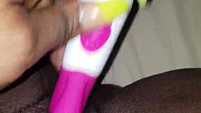 she struggled with the vibrator on her wet hairy pussy, but kept going.