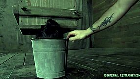 widening slave's pussy in rough bondage