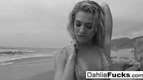Hot Dahlia indulges in naughty beach squirting with her blonde ass and tits