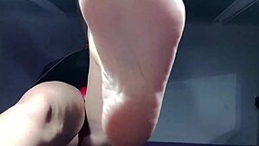 she says, 'worship my feet, slave.'