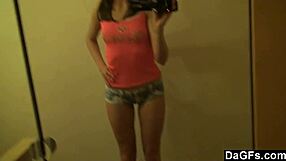 Watch this petite brunette have fun alone with her camera