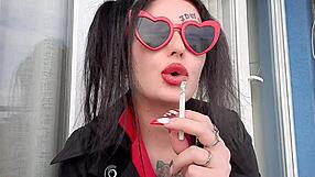 Dominatrix nika showcases sexy smoking fetish