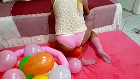 Latina teen plays with big ass balloon fetish