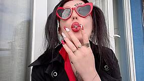 Dominatrix nika showcases sexy smoking fetish